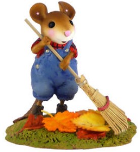 a cute autumn mouse raking